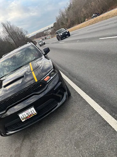 Highway roadside response for a black Dodge Charger with Maryland plates
